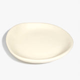 Dinosaur Designs Extra Large Bones Bowl in Cream —  handmade cream resin shallow decorative bowl with a rounded organic form