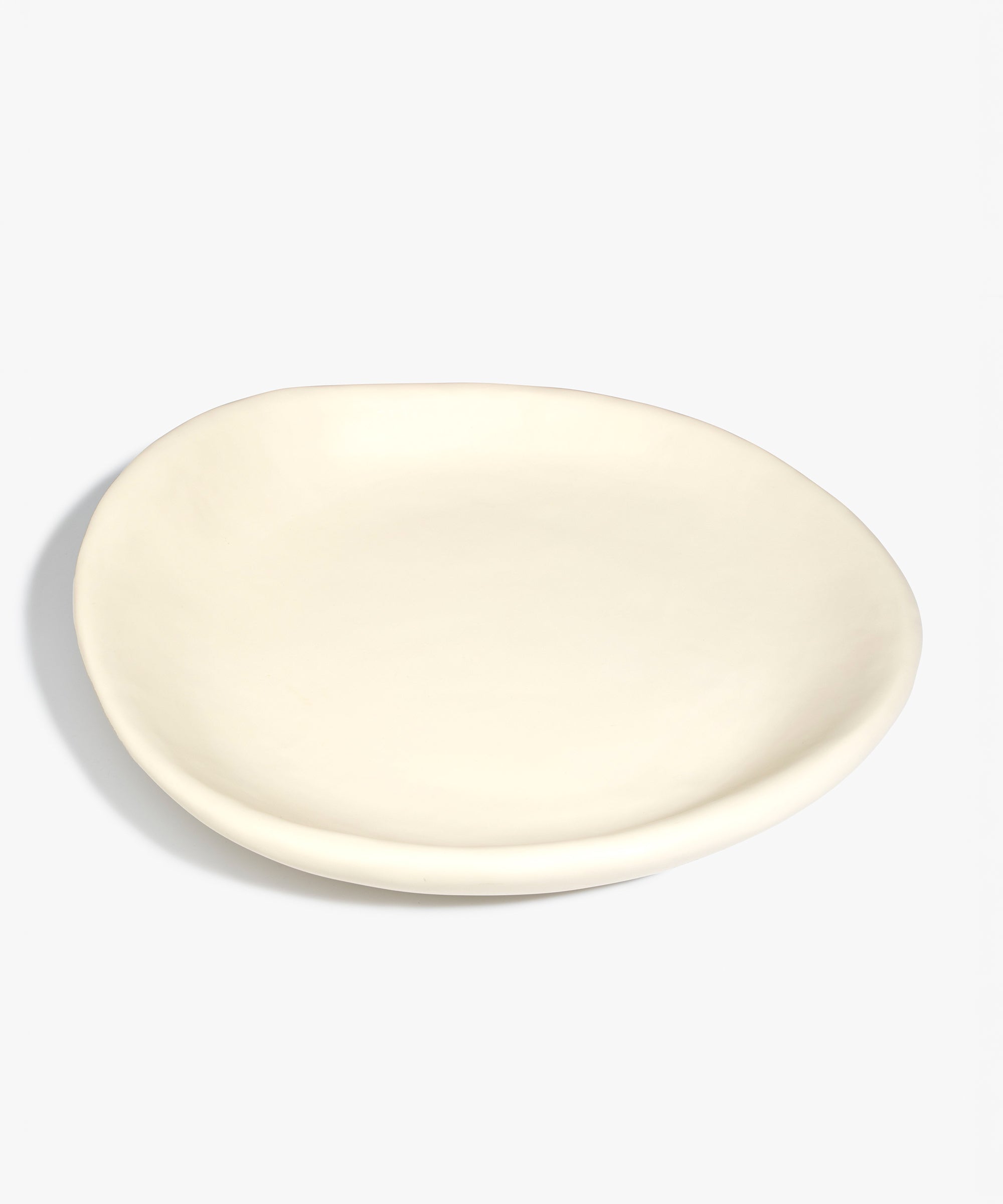 Dinosaur Designs Extra Large Bones Bowl in Cream —  handmade cream resin shallow decorative bowl with a rounded organic form
