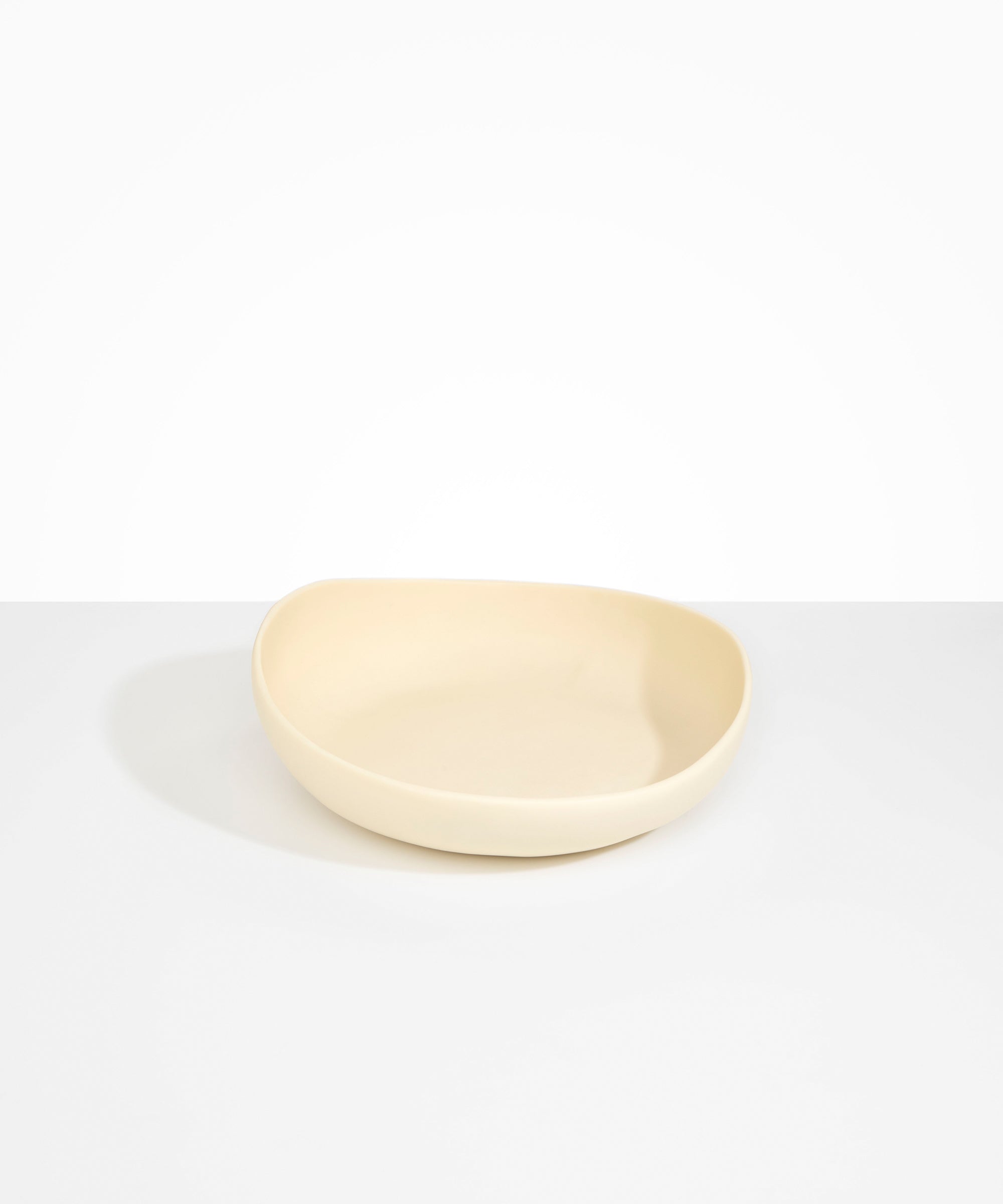 Dinosaur Designs BWLFLOMED Medium Flow Bowl in Cream colour resin..
