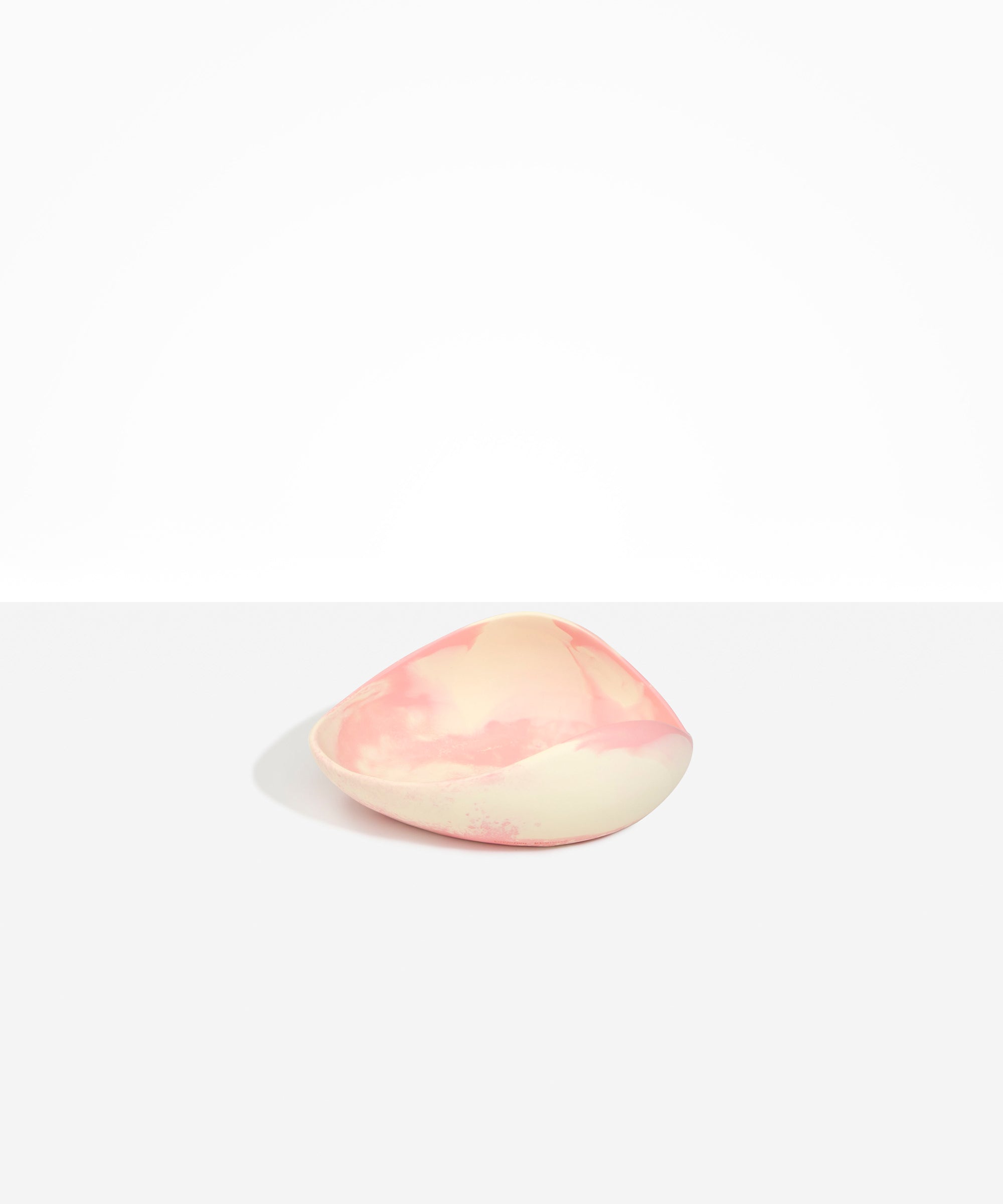 Dinosaur Designs Small Leaf Bowl in Blossom — handcrafted marbled pink and cream resin bowl with curved organic form