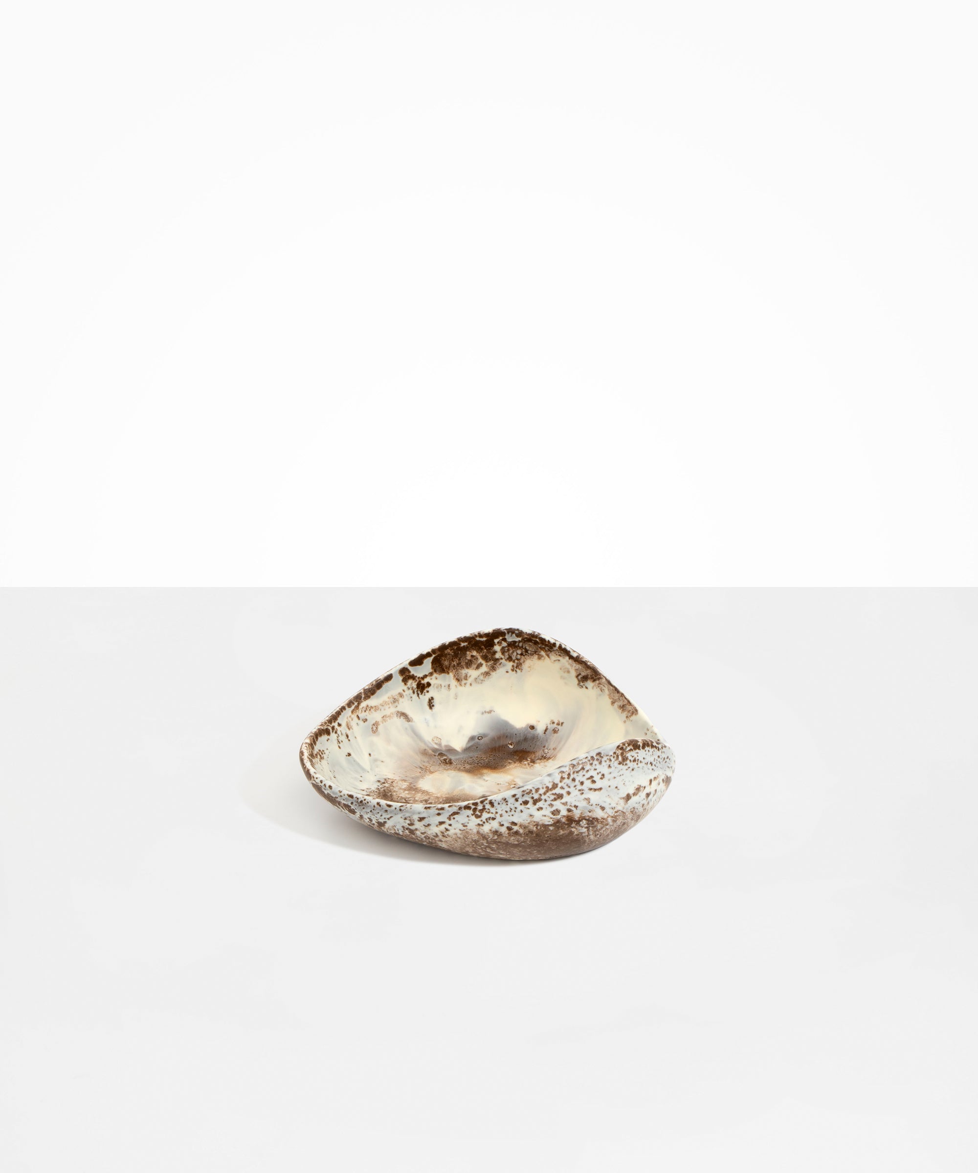Dinosaur Designs Small Leaf Bowl in Cappuccino — handcrafted marbled brown and cream resin bowl with curved organic form