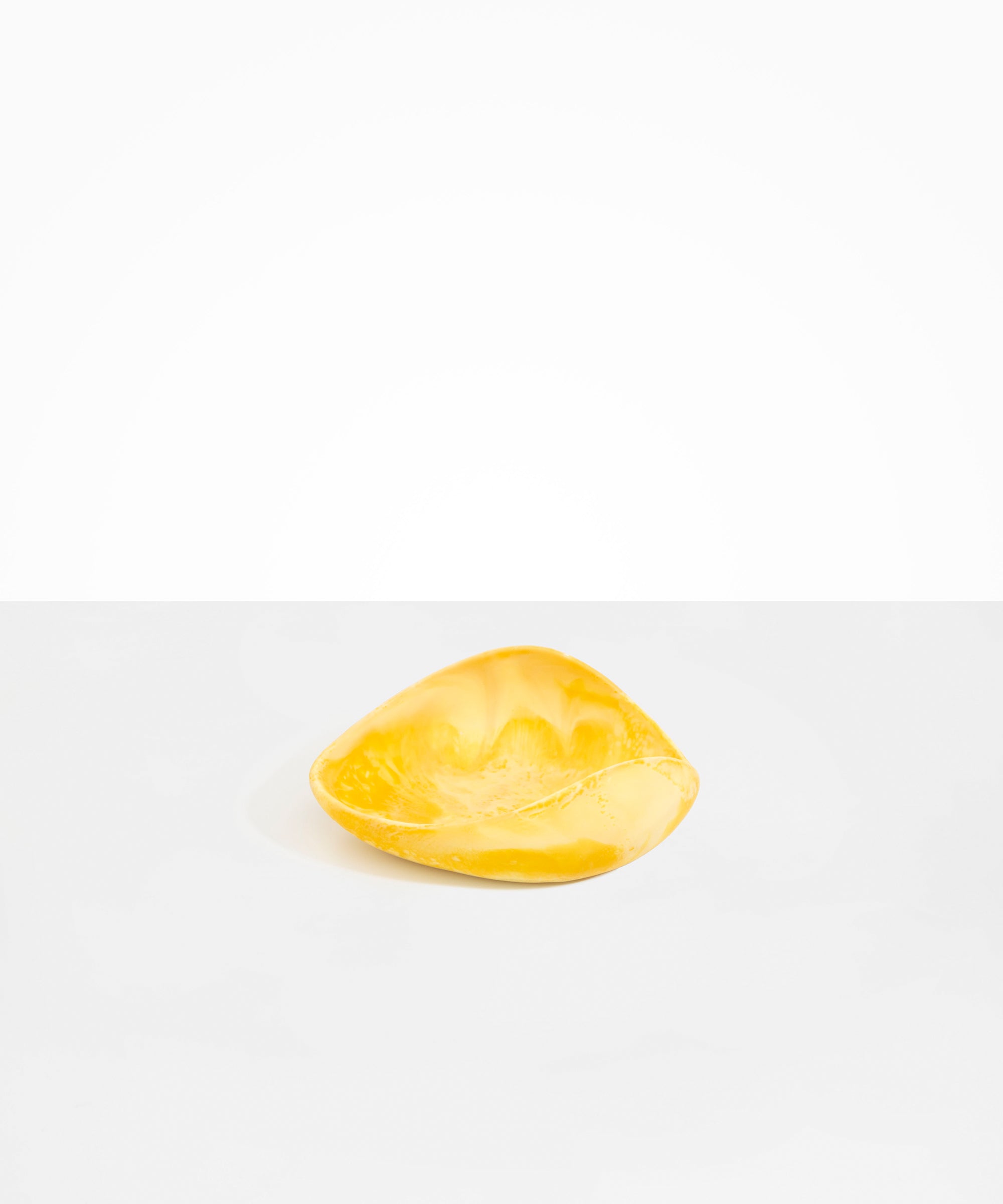 Dinosaur Designs Small Leaf Bowl in Daisy — handcrafted marbled yellow resin bowl with curved organic form