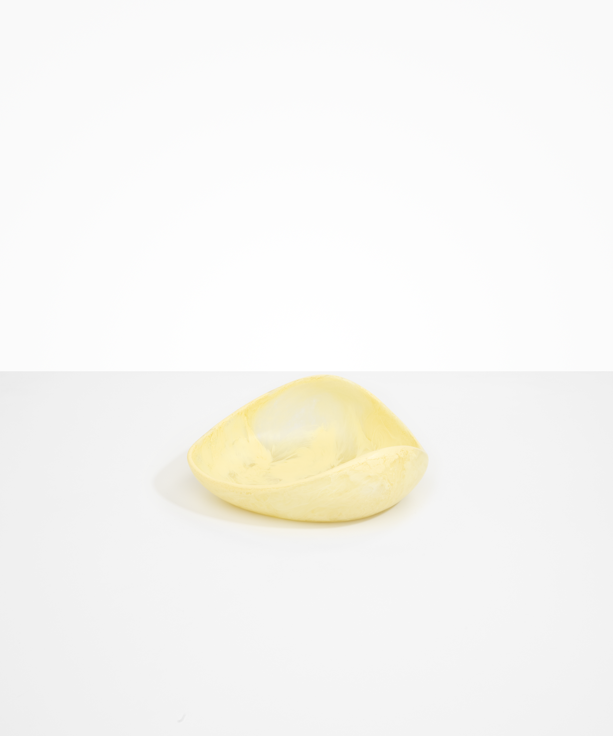 Dinosaur Designs Small Leaf Bowl in Lemon — handcrafted marbled yellow resin bowl with curved organic form