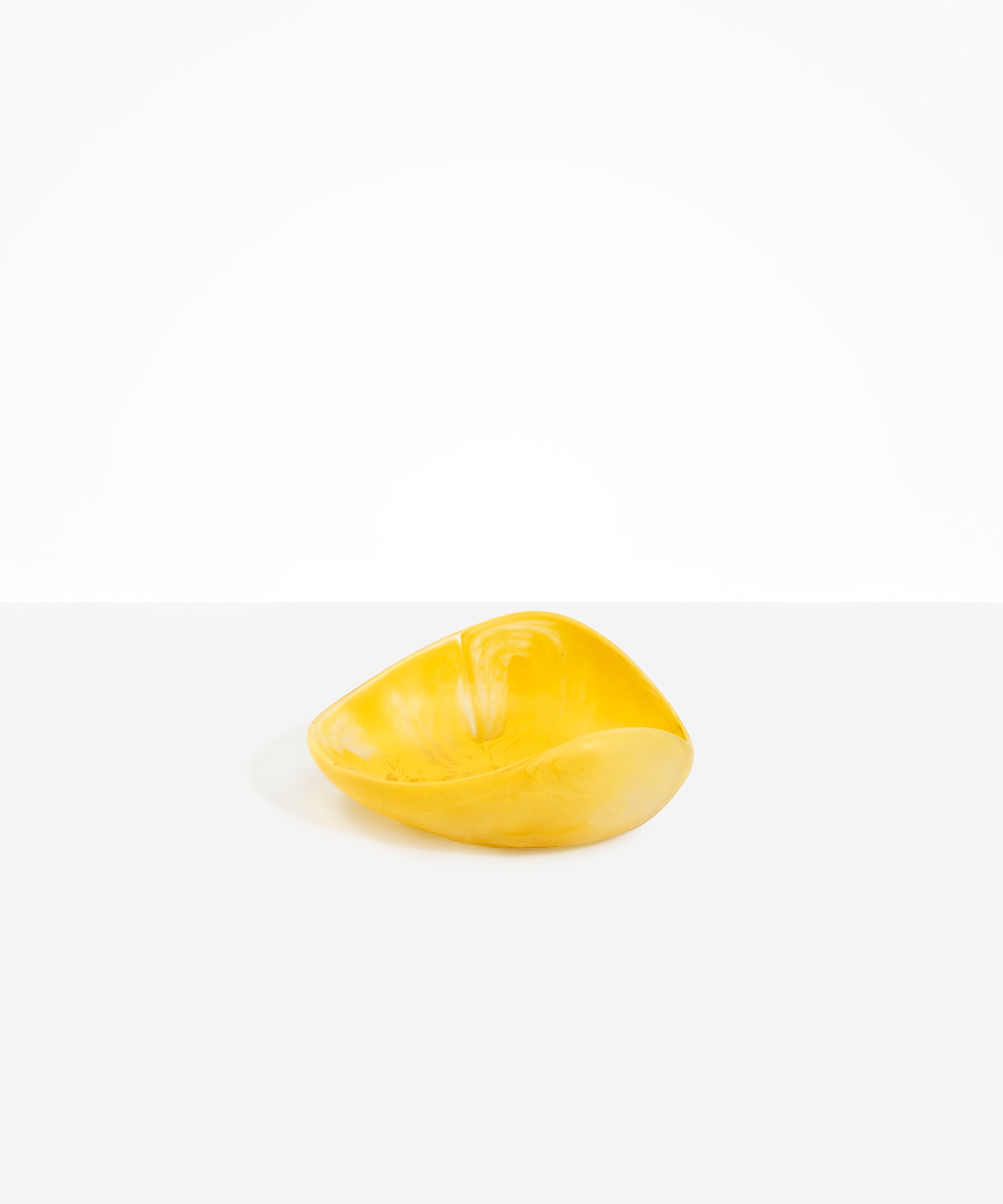 Dinosaur Designs Small Leaf Bowl in Pollen — handcrafted marbled yellow resin bowl with curved organic form