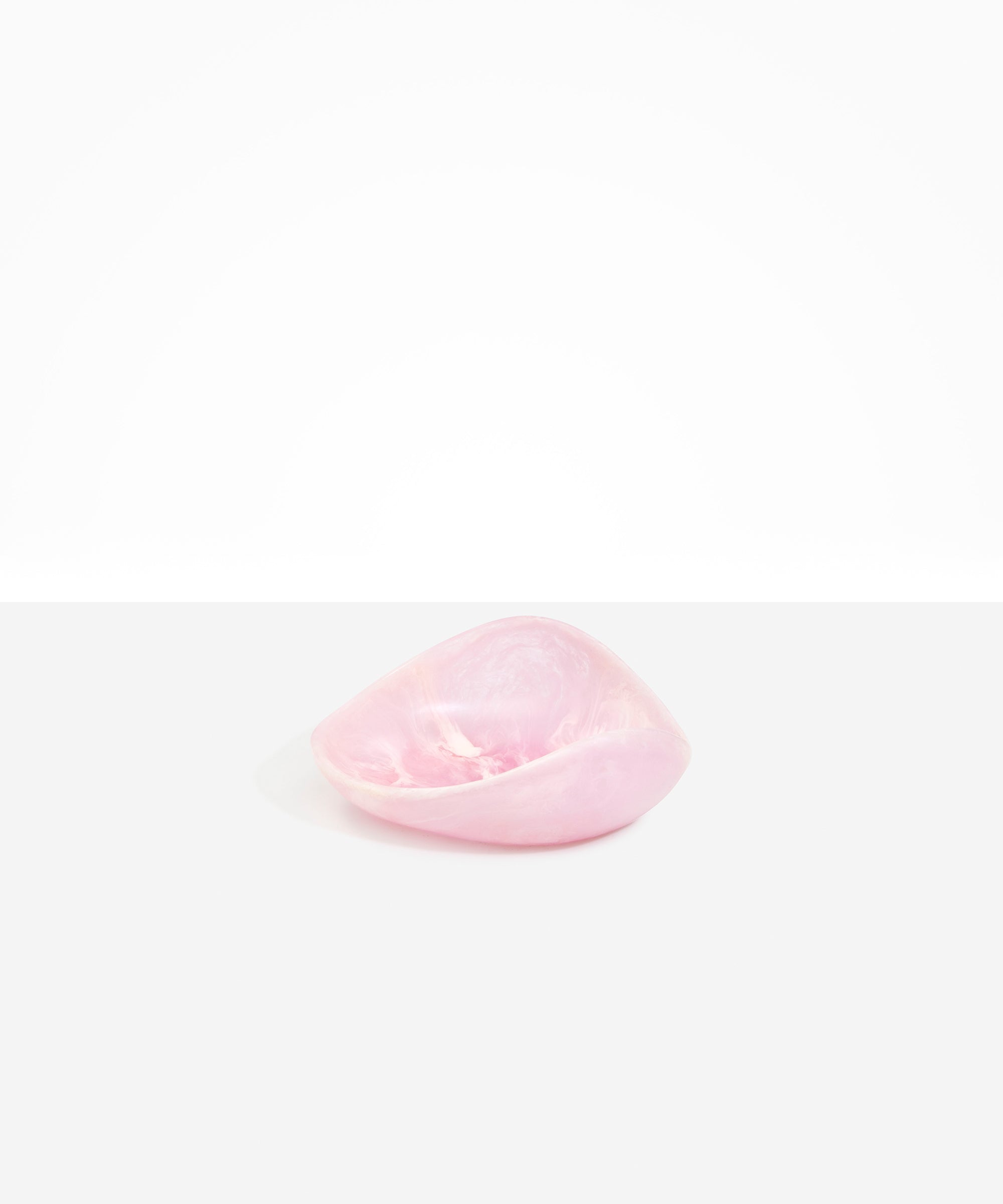 Dinosaur Designs Small Leaf Bowl in Shell Pink — handcrafted marbled pink resin bowl with curved organic form