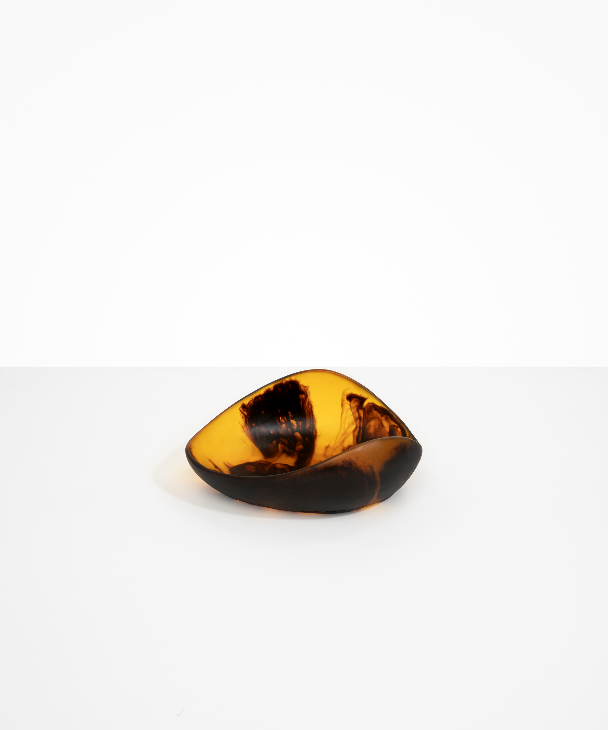 Dinosaur Designs Small Leaf Bowl in Tortoise — handcrafted marbled transparent amber and black resin bowl with curved organic form