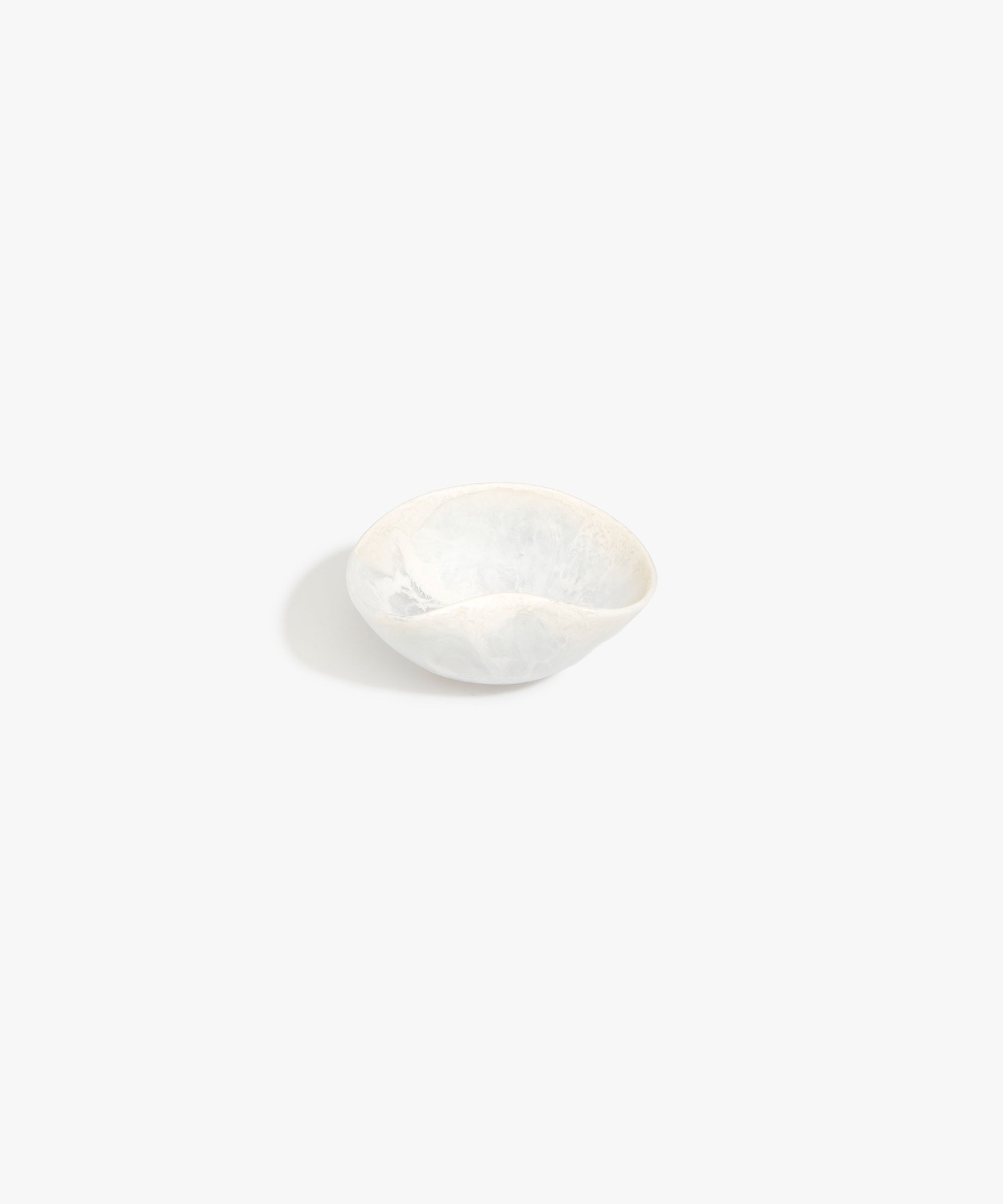 Dinosaur Designs Petal Dessert Bowl in Chalk Swirl — handcrafted marbled off-white resin bowl with curved form and pinched organic rim