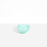 Dinosaur Designs Petal Dessert Bowl in Mint — handcrafted marbled mint blue resin bowl with curved form and pinched organic rim