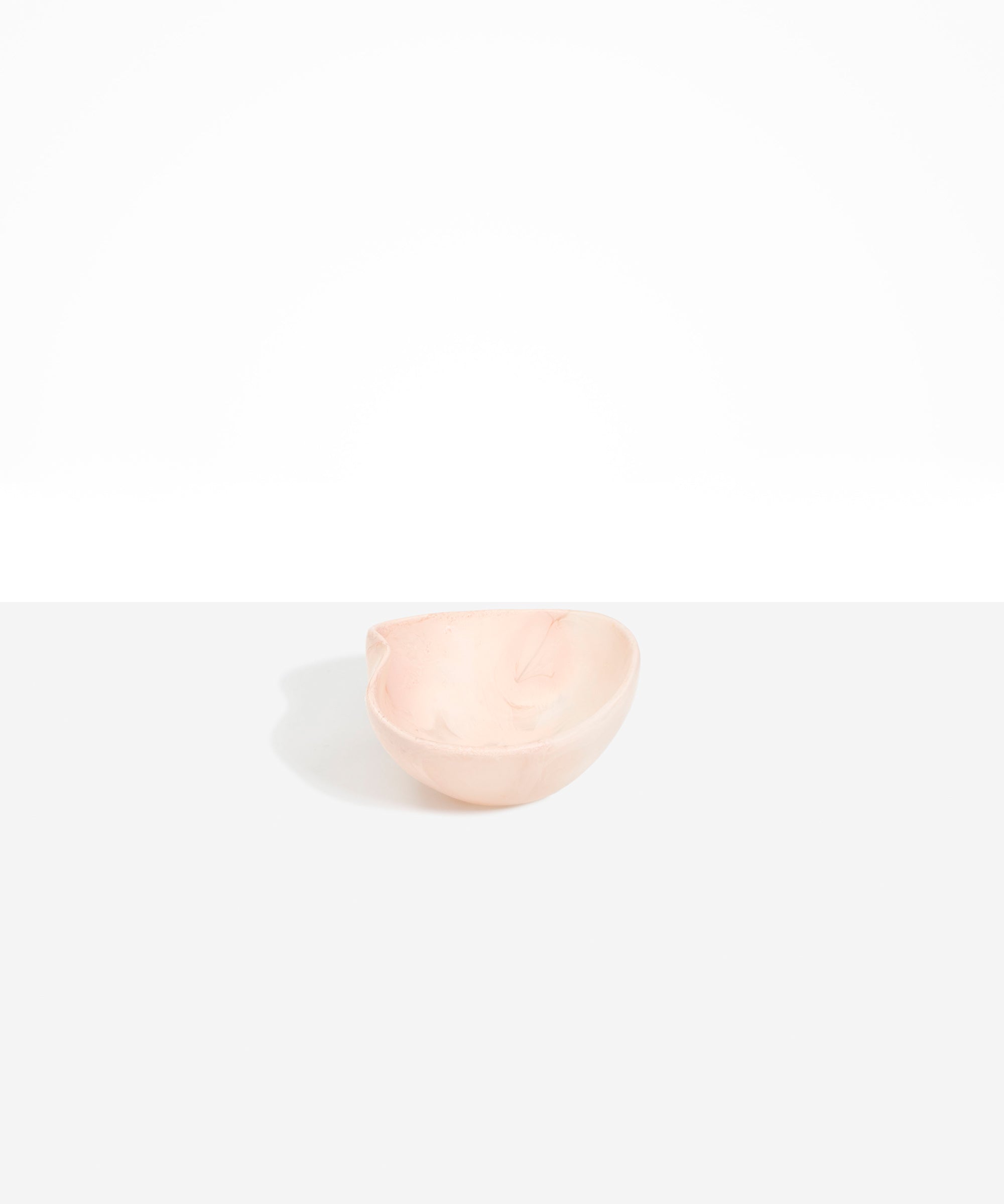 Dinosaur Designs Petal Dessert Bowl in Rose Swirl — handcrafted marbled dusty pink resin bowl with curved form and pinched organic rim