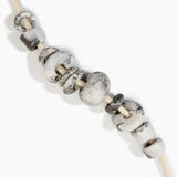 Dinosaur Designs Drift Choker in Granite with Plated-Silver — marbled cream and grey resin pebble beads on a wood silk cord with silver-plated end cap