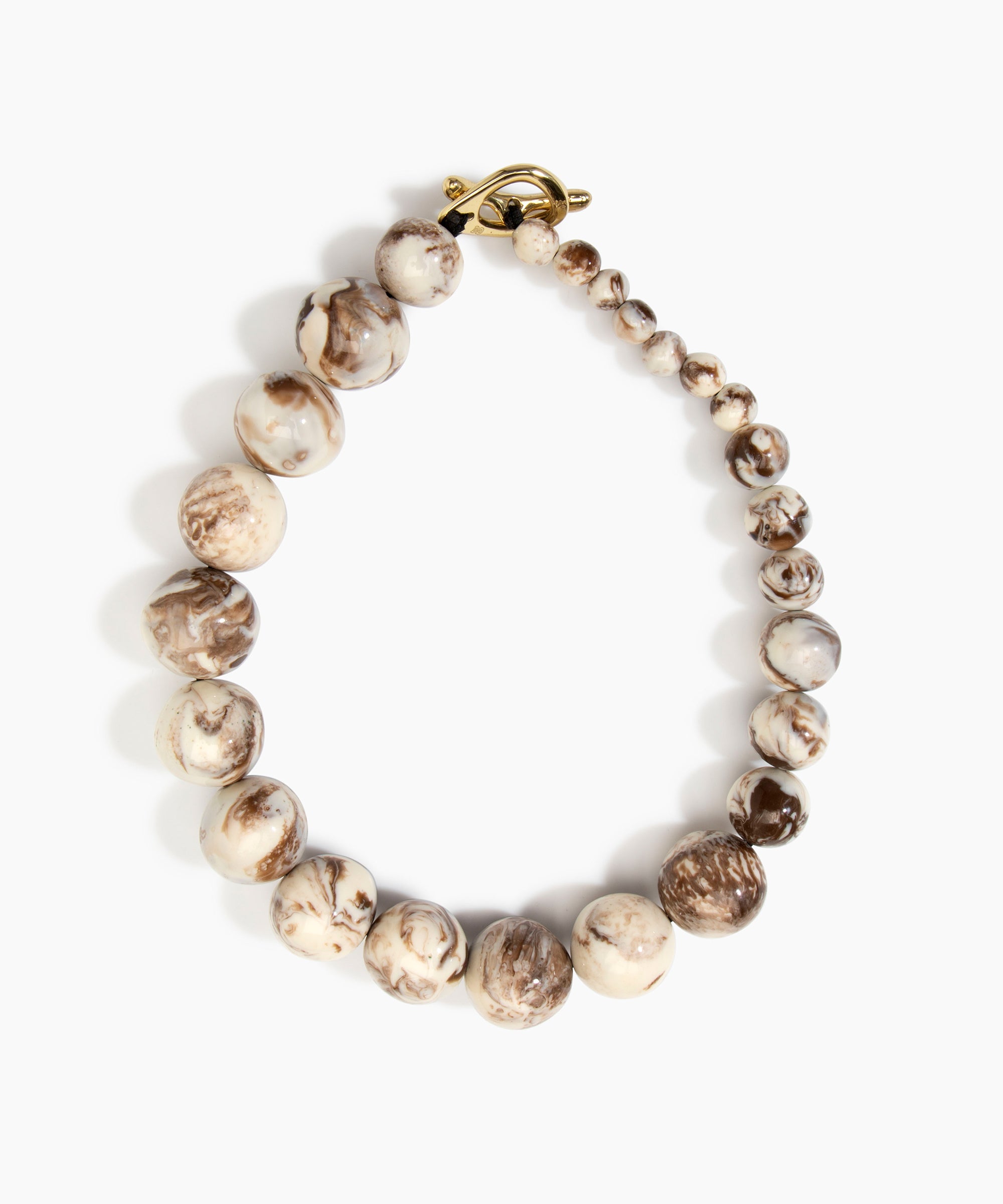 Dinosaur Designs Polished Organic Ball Choker in Cappuccino — handcrafted marbled cream and brown polished resin graduating bead choker necklace with brass t-bar clasp