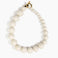 Dinosaur Designs Polished Organic Ball Choker in Chalk Swirl — handcrafted marbled off-white and clear polished resin graduating bead choker necklace with brass t-bar clasp