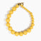 Dinosaur Designs Polished Organic Ball Choker in Pollen — handcrafted marbled yellow and clear polished resin graduating bead choker necklace with brass t-bar clasp