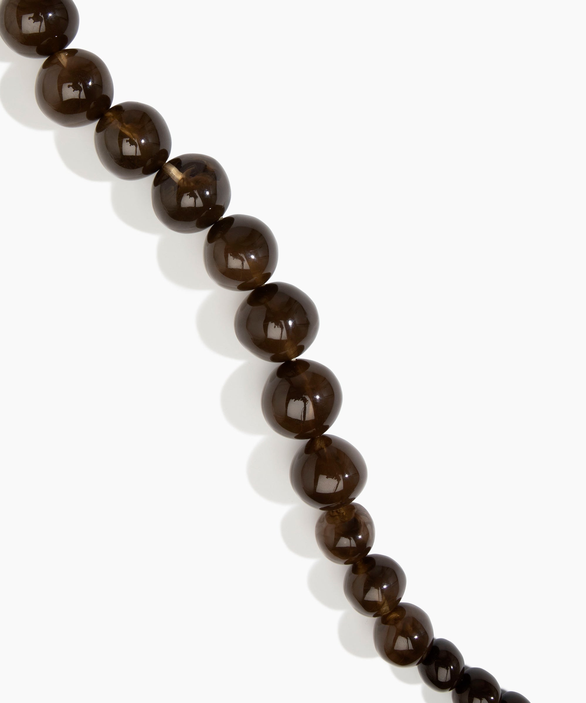 Dinosaur Designs Polished Organic Ball Necklace in Cocoa — handcrafted marbled brown and transparent polished resin graduating bead necklace with silver t-bar clasp.