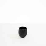 Dinosaur Designs Large Rock Cup in Black — handcrafted black resin cup with rounded bulbous form and open organic rim