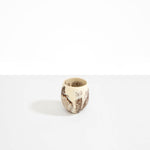 Dinosaur Designs Large Rock Cup in Cappuccino — handcrafted marbled brown and cream resin cup with rounded bulbous form and open organic rim