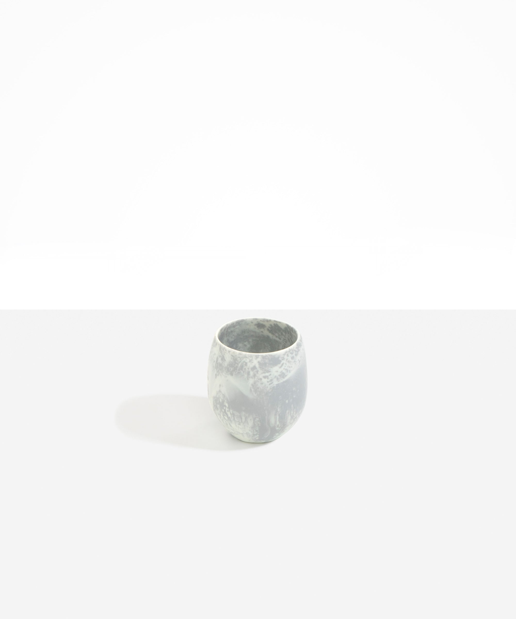 Dinosaur Designs Large Rock Cup in Cloud — handcrafted marbled grey and cream resin cup with rounded bulbous form and open organic rim