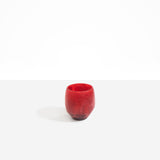 Dinosaur Designs Large Rock Cup in Cranberry — handcrafted marbled red and transparent resin cup with rounded bulbous form and open organic rim