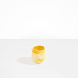 Dinosaur Designs Large Rock Cup in Yellow — handcrafted marbled yellow resin cup with rounded bulbous form and open organic rim