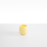 Dinosaur Designs Large Rock Cup in Lemon — handcrafted marbled yellow and transparent resin cup with rounded bulbous form and open organic rim