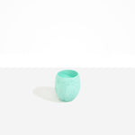 Dinosaur Designs Large Rock Cup in Mint — handcrafted marbled green blue and transparent resin cup with rounded bulbous form and open organic rim