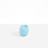 Dinosaur Designs Large Rock Cup in Pool — handcrafted marbled blue and transparent resin cup with rounded bulbous form and open organic rim