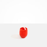 Dinosaur Designs Large Rock Cup in Poppy — handcrafted marbled red and transparent resin cup with rounded bulbous form and open organic rim