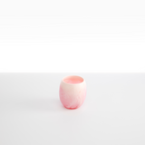 Dinosaur Designs Large Rock Cup in Shell Pink — handcrafted marbled pink and transparent resin cup with rounded bulbous form and open organic rim