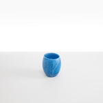 Dinosaur Designs Large Rock Cup in Sky — handcrafted marbled blue and transparent resin cup with rounded bulbous form and open organic rim