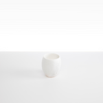 Dinosaur Designs Large Rock Cup in Snow Swirl — handcrafted marbled white and transparent resin cup with rounded bulbous form and open organic rim
