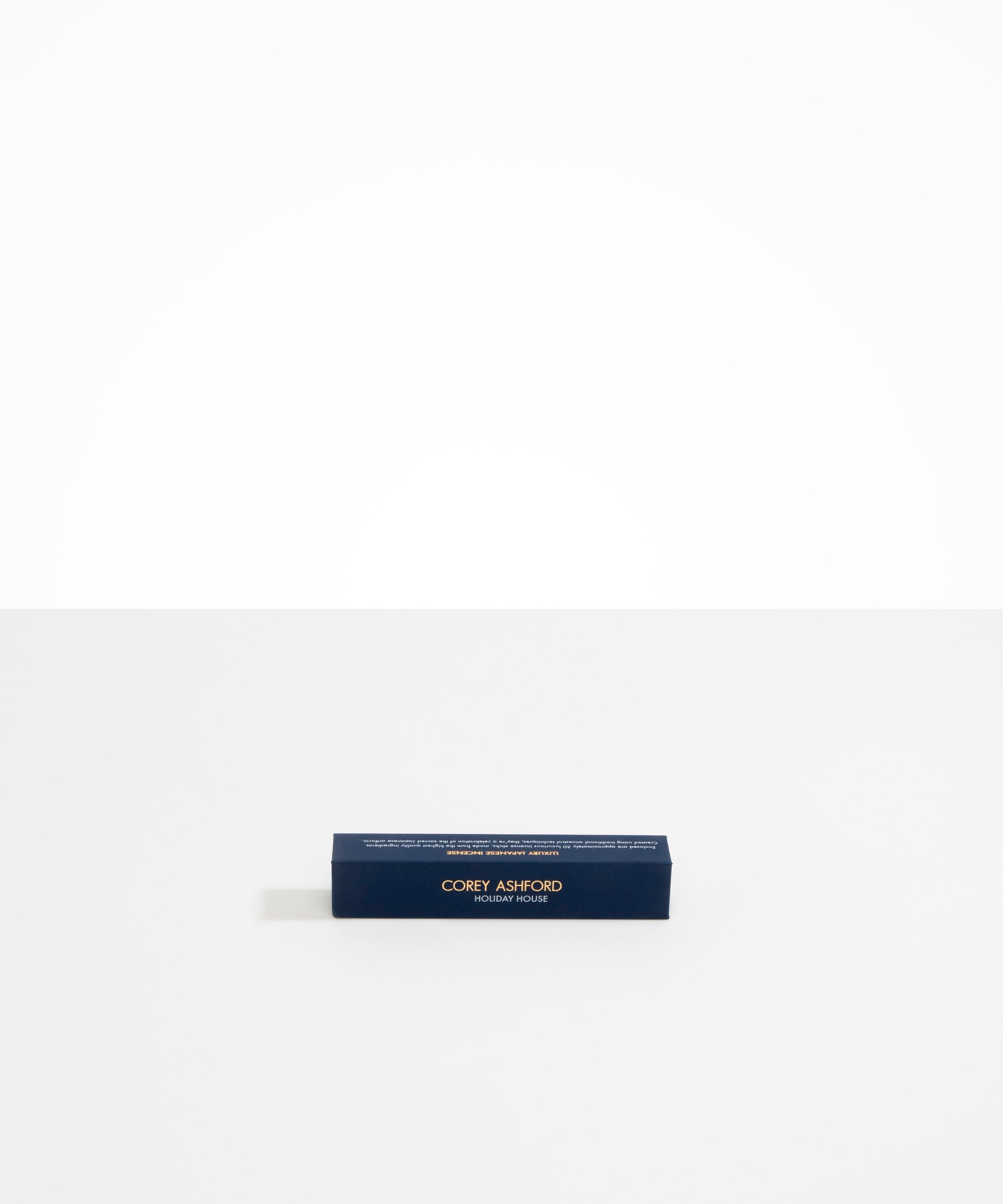 Dinosaur Designs Corey Ashford Holiday House Japanese Incense — blue box of sandalwood, cedar and pine scented incense sticks