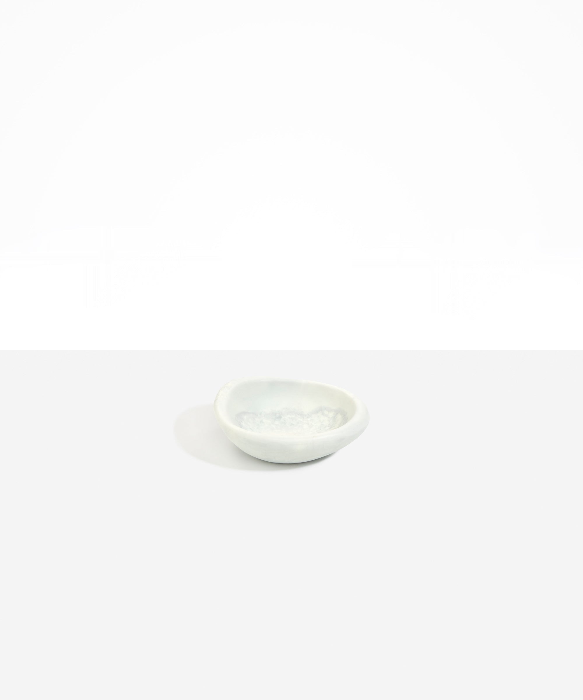Dinosaur Designs Bones Dish in Cloud — small handcrafted grey and cream marbled resin trinket dish with organic form...