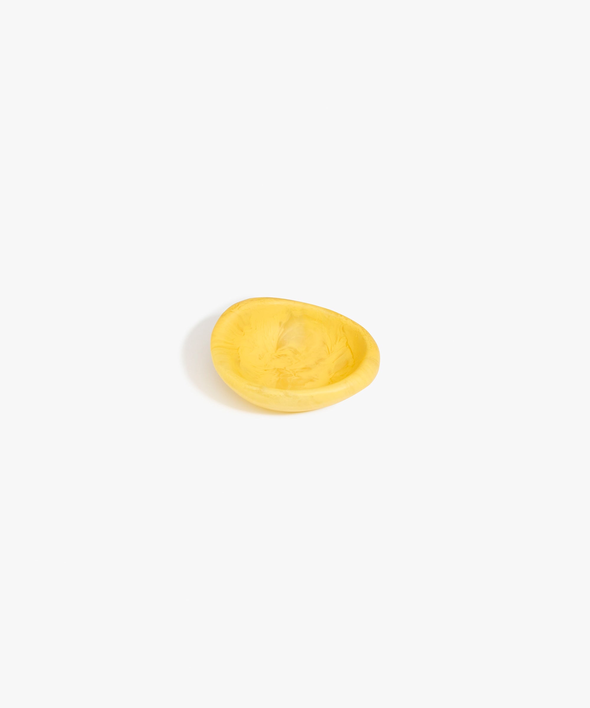 Dinosaur Designs Bones Dish in Pollen — small handcrafted yellow marbled resin trinket dish with organic form..