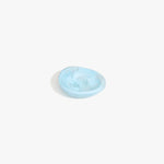 Dinosaur Designs Bones Dish in Pool — small handcrafted blue marbled resin trinket dish with organic form..