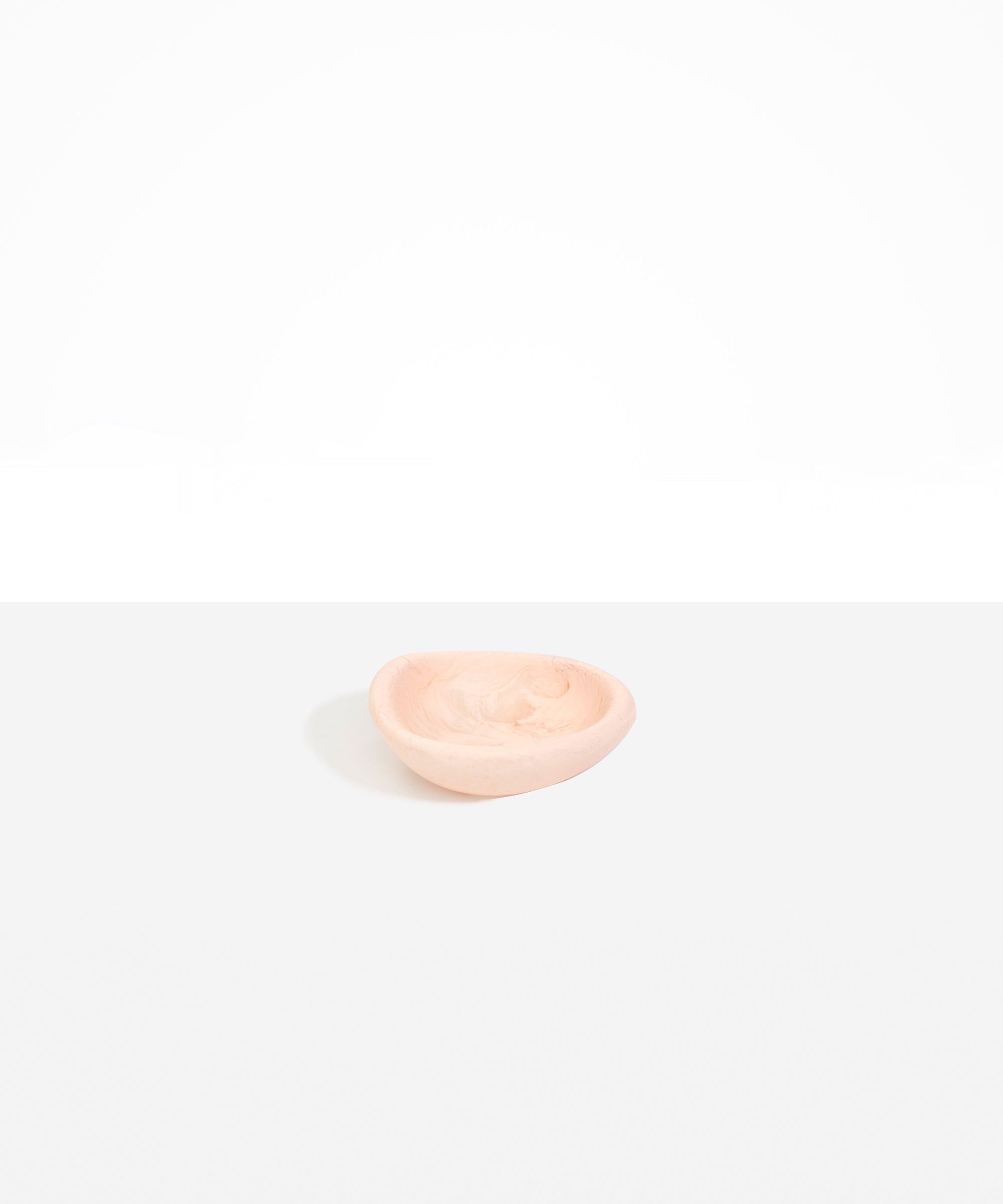 Dinosaur Designs Bones Dish in Rose Swirl — small handcrafted pink marbled resin trinket dish with organic form..