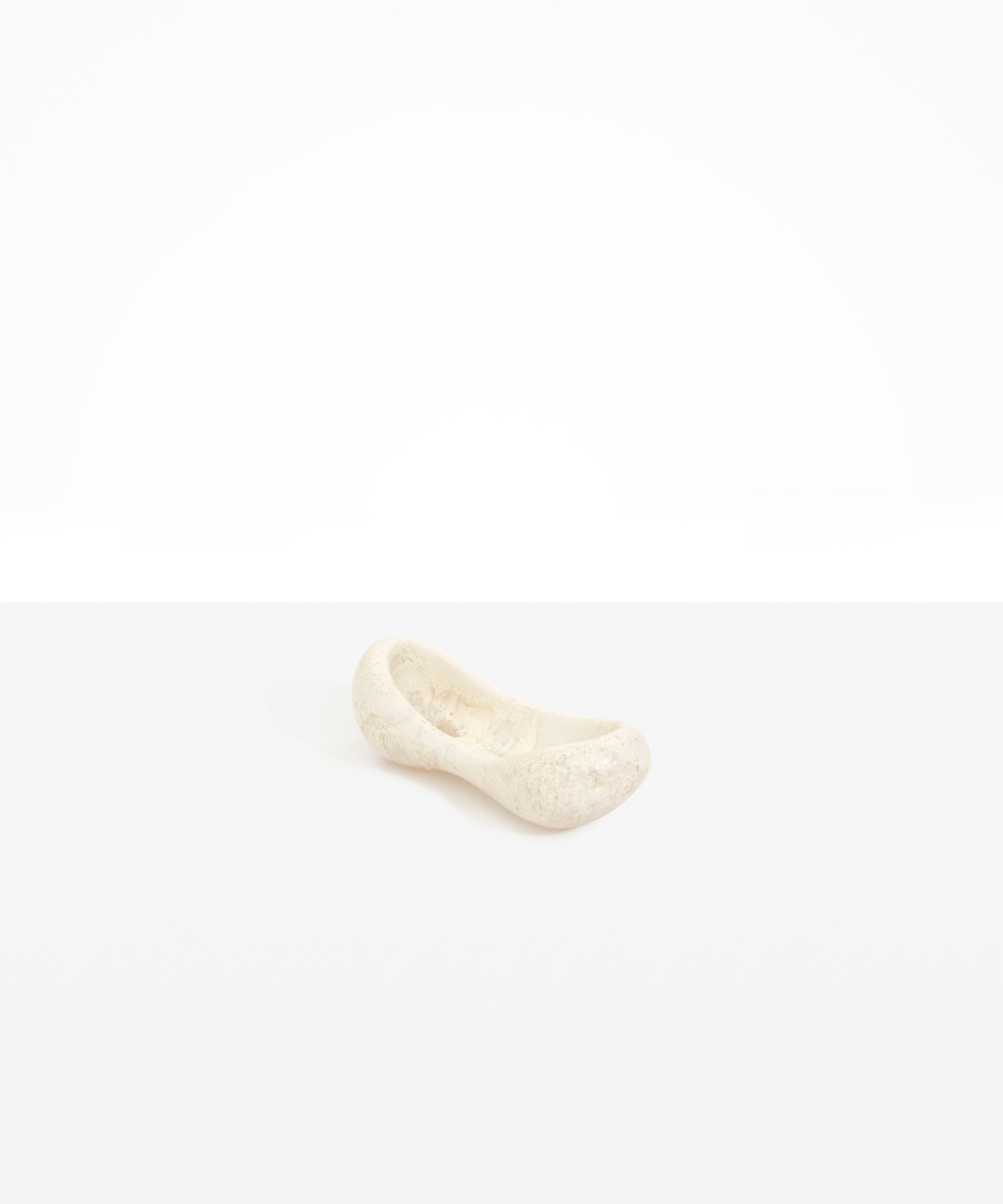 Dinosaur Designs Bones Dish in Chalk Swirl — handcrafted marbled off-white resin trinket dish with pinched bone-shaped organic form