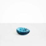 Dinosaur Designs Drift Dish in Water— handcrafted marbled light and dark blue resin chunky trinket dish with organic form