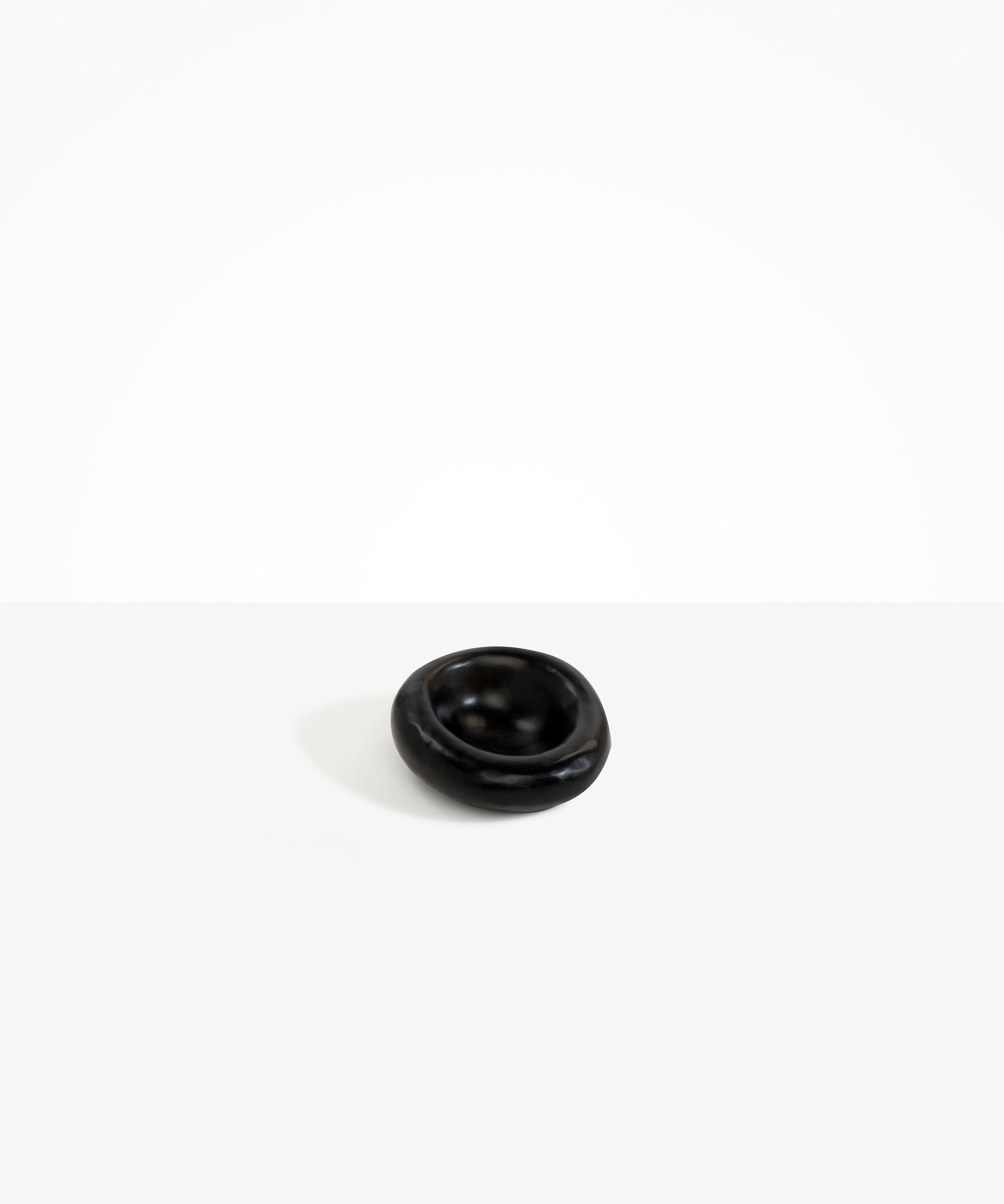Dinosaur Designs Medium Drift Dish in Black— handcrafted black resin chunky trinket dish with organic form