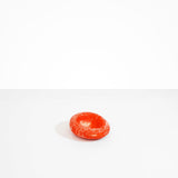 Dinosaur Designs Medium Drift Dish in Strawberry— handcrafted marbled light and dark red resin chunky trinket dish with organic form