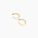 Dinosaur Designs Large Pebble Duo Hoop Earrings in Cream — cream resin hoop earrings with polished brass inner face and stud fastening