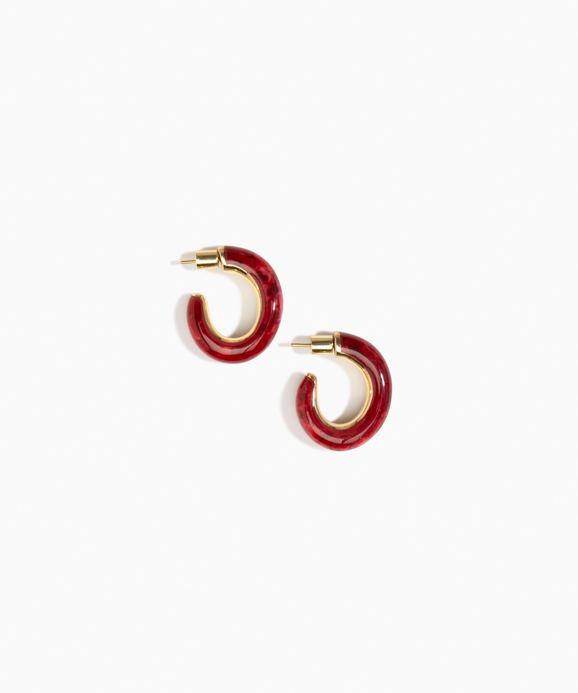 Dinosaur Designs Medium Pebble Duo Hoop Earrings in Cranberry — marbled red resin hoop earrings with polished brass inner face and stud fastening
