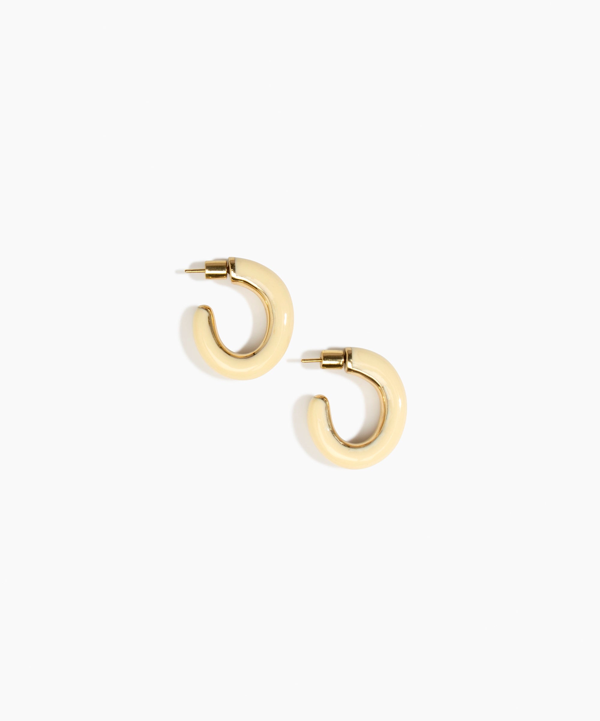 Dinosaur Designs Medium Pebble Duo Hoop Earrings in Cream — cream resin hoop earrings with polished brass inner face and stud fastening
