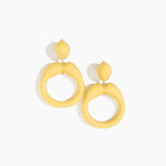 Dinosaur Designs Sprout Hoop Earrings in Pollen colour — marbled yellow resin oversized irregular hoop drop earrings with small oval resin stud top and gold-plated hardware