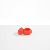Dinosaur Designs JARPEBMED Medium Pebble Jar in Lychee orange colour resin