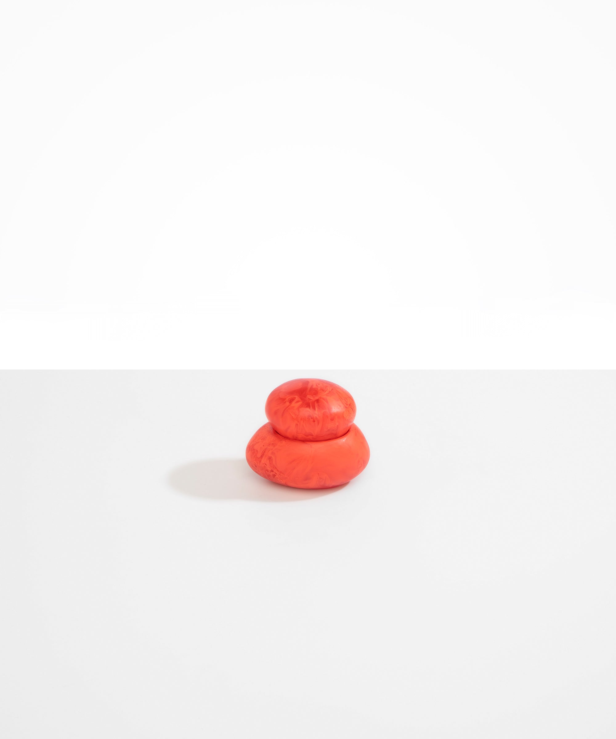 Dinosaur Designs JARPEBMED Medium Pebble Jar in Lychee orange colour resin