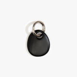 Dinosaur Designs Earth Keyring in Black — handcrafted Black resin pebble bead on a polished gunmetal jump ring