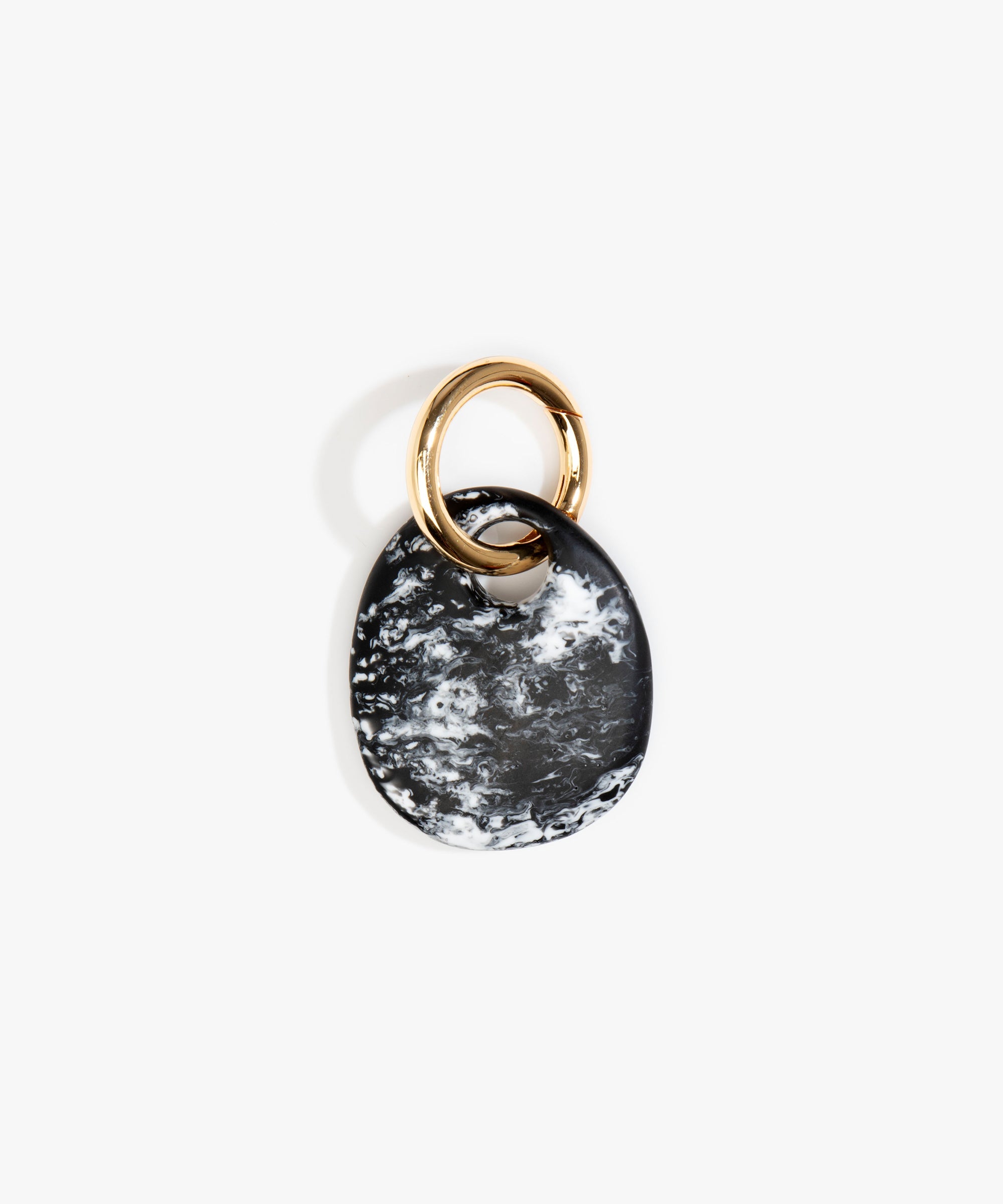 Dinosaur Designs Earth Keyring in Black Marble — handcrafted marbled Black and white resin pebble bead on a polished brass jump ring