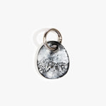 Dinosaur Designs Earth Keyring in Black Marble — handcrafted marbled Black and white resin pebble bead on a polished gunmetal jump ring