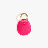 Dinosaur Designs Earth Keyring in Flamingo — handcrafted marbled fuschia pink resin pebble bead on a polished brass jump ring