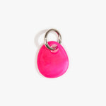 Dinosaur Designs Earth Keyring in Flamingo — handcrafted marbled fuschia pink resin pebble bead on a polished gunmetal jump ring